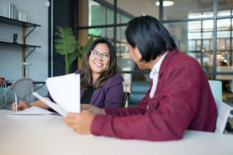 Web-image-Template-Half-screen-Data-and-AI-2-800x533 Women with papers