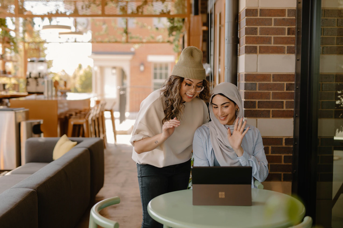 Web-image-Template-Half-screen-Involv-6 Women waving at surface pro