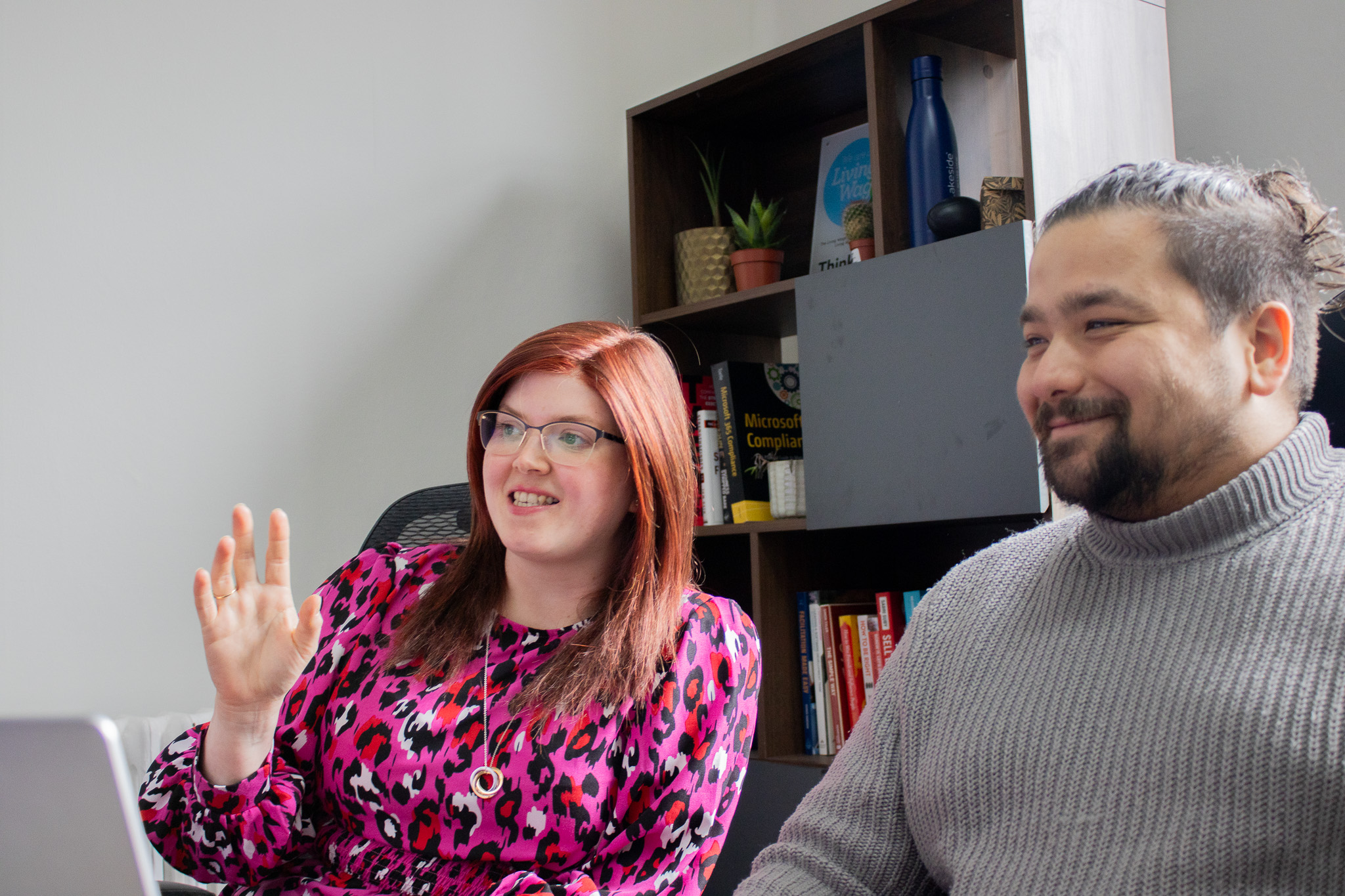 A one-on-one training session using Microsoft Copilot on their laptop.